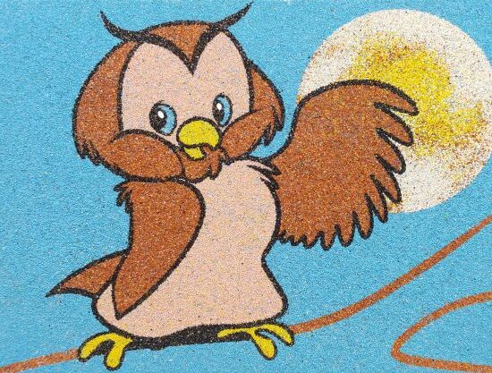 Okos bagoly homokkép